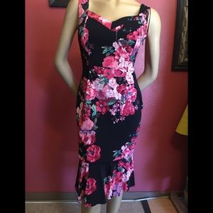 Ruffle rose dress made by Morgan de toi.